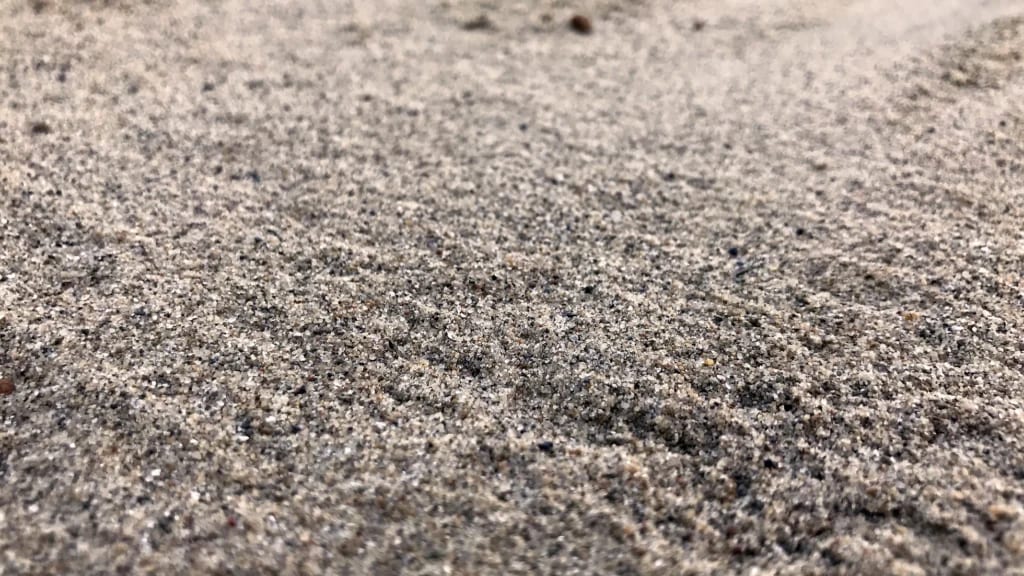 A photo of fine pool sand at Straight Line fence.